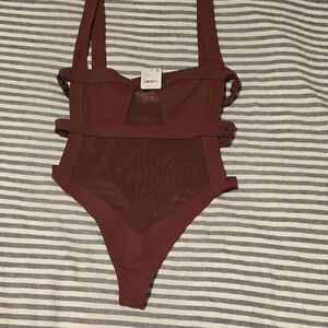Stylish Burgundy Body Suit with Mesh Accent